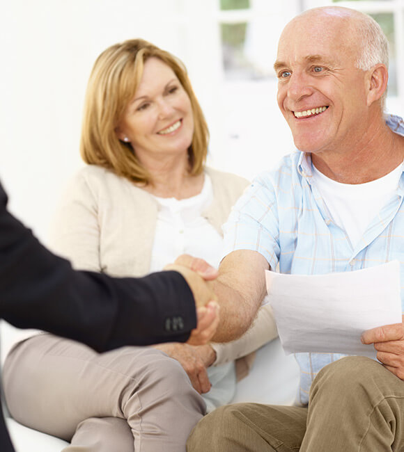 man shaking persons hand
