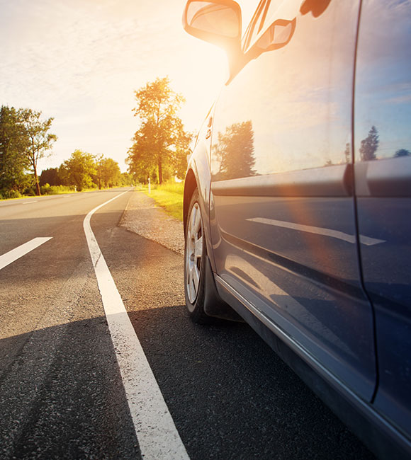 car on a sunny road
